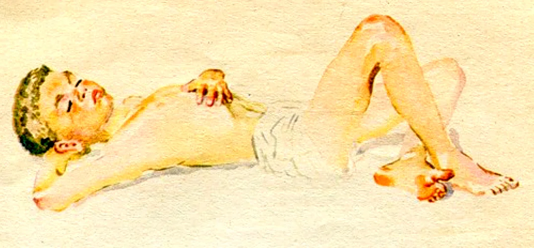 Мальчик загорает