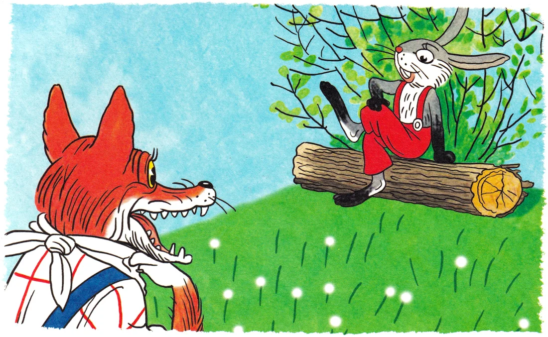 Кролик сидит на бревне