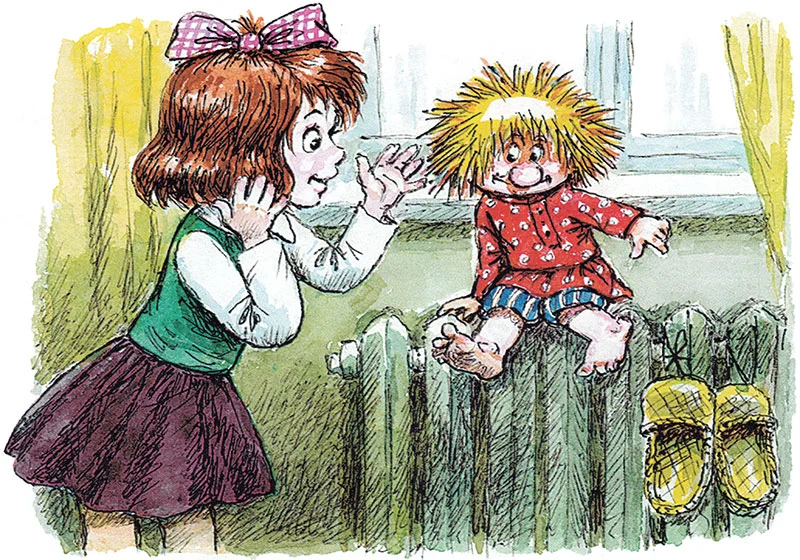 Кузька сидит на батарее