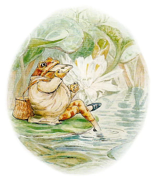 Лягушонок ест сендвич