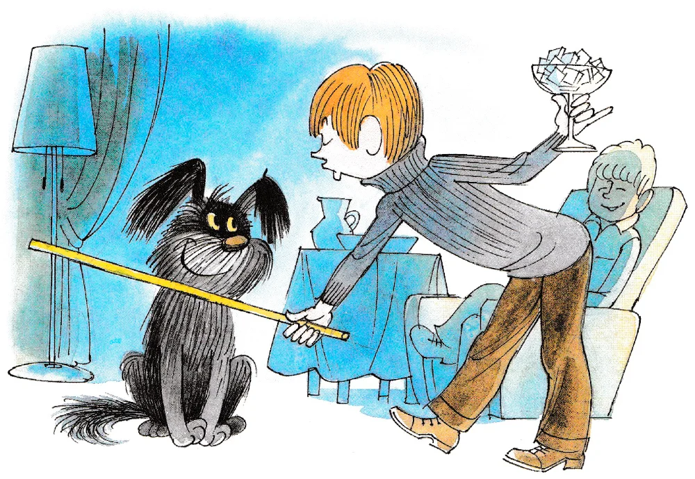 Мальчик дрессирует собаку